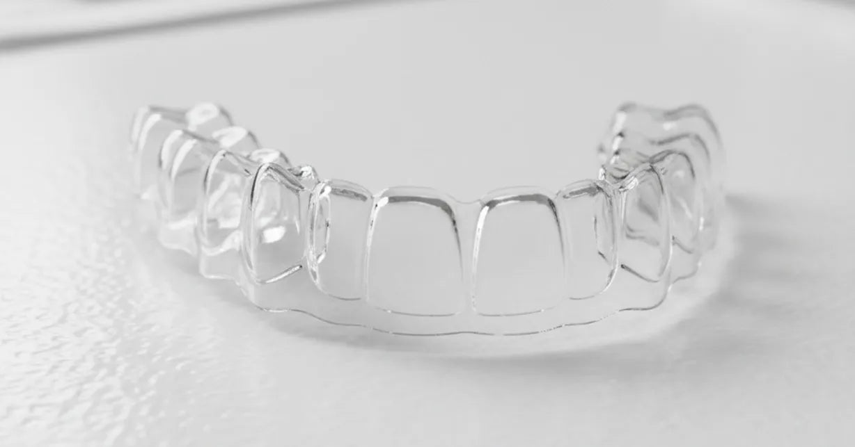 NewSmile custom night guard made of BPA-free clear material, showing smooth and durable design.