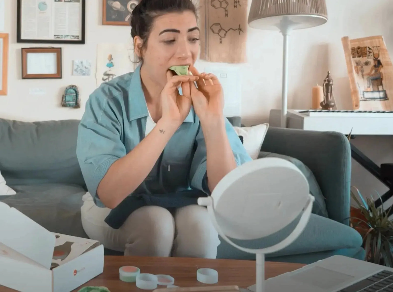 Hands taking impressions at home while looking at the mirror