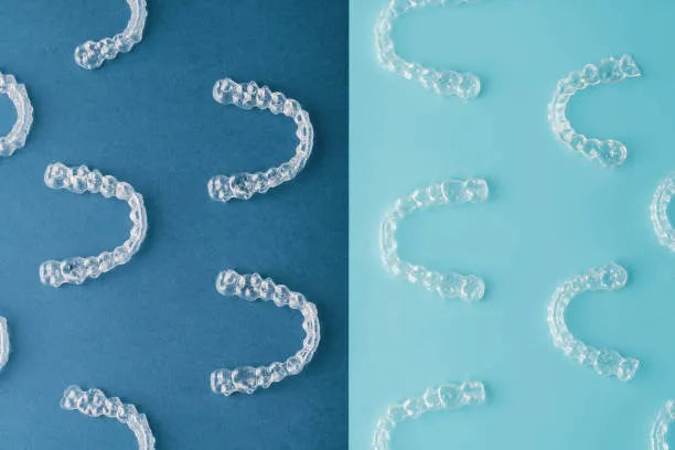 Two sets of clear retainers side by side